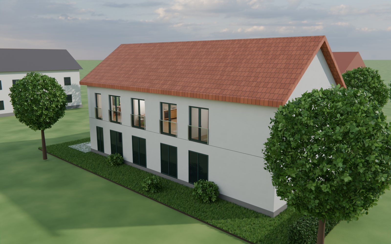 Außenansicht von Haus B mit französischen Balkonen auf der Längsseite